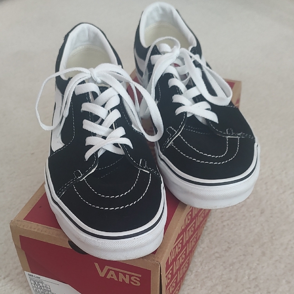 Vans Black and White Athletic Shoes with Classic Low-Top Design